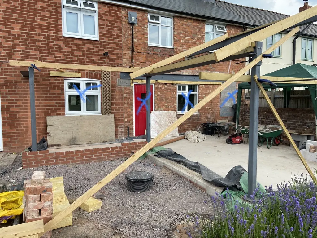 Steel frame and first rafters - Rear extension - New kitchen + living space in Harmer Hill