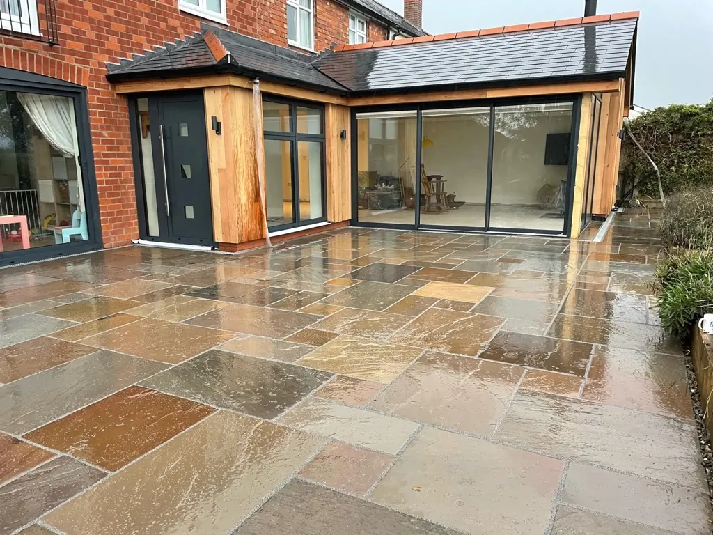 Finished patio and doors - Rear extension - New kitchen + living space in Harmer Hill